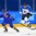 GANGNEUNG, SOUTH KOREA - FEBRUARY 17: Finland's Ronja Savolainen #88 jumps over the puck with Sweden's Johanna Fallman #5 looking on during quarterfinal round action at the PyeongChang 2018 Olympic Winter Games. (Photo by Matt Zambonin/HHOF-IIHF Images)

